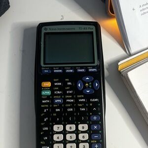 Texas Instruments TI-83 Plus Graphing Calculator - Black and Blue